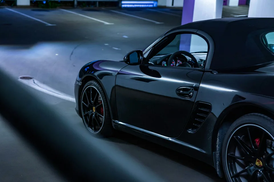Black convertible, illustrative image, not a listing